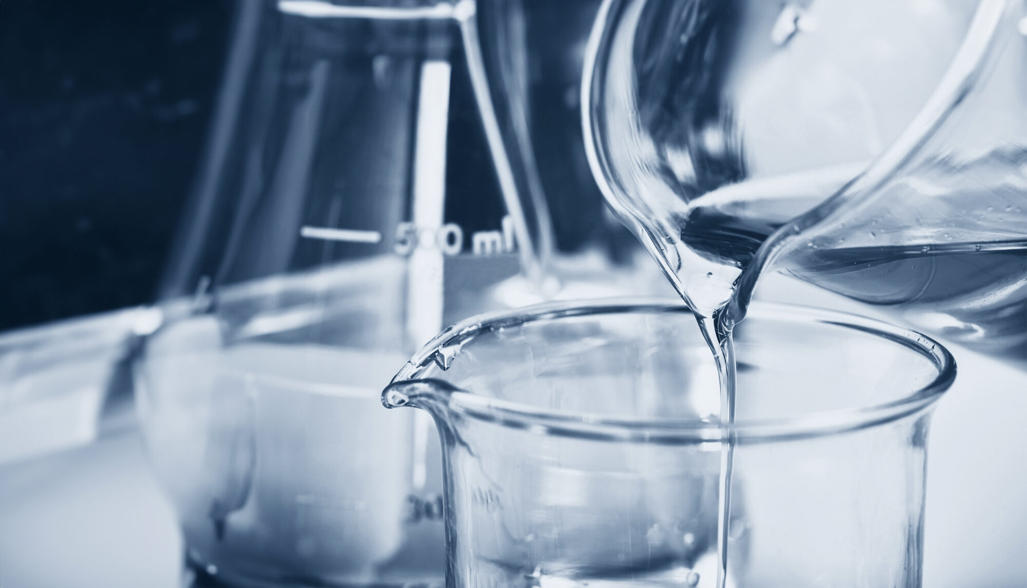 Oil pouring, Laboratory and science experiments, Formulating the chemical for medical research, Quality control of petroleum industry products concept.